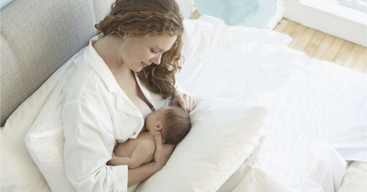 A mother breastfeeding,