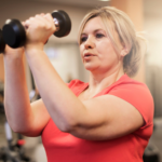 Middle-age woman working out.