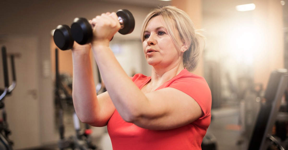 Middle-age woman working out.