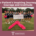 a group of cheerleaders supporting breast cancer awareness